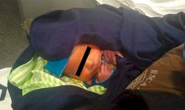 Un neonato abbandonato in una scatola della pizza.